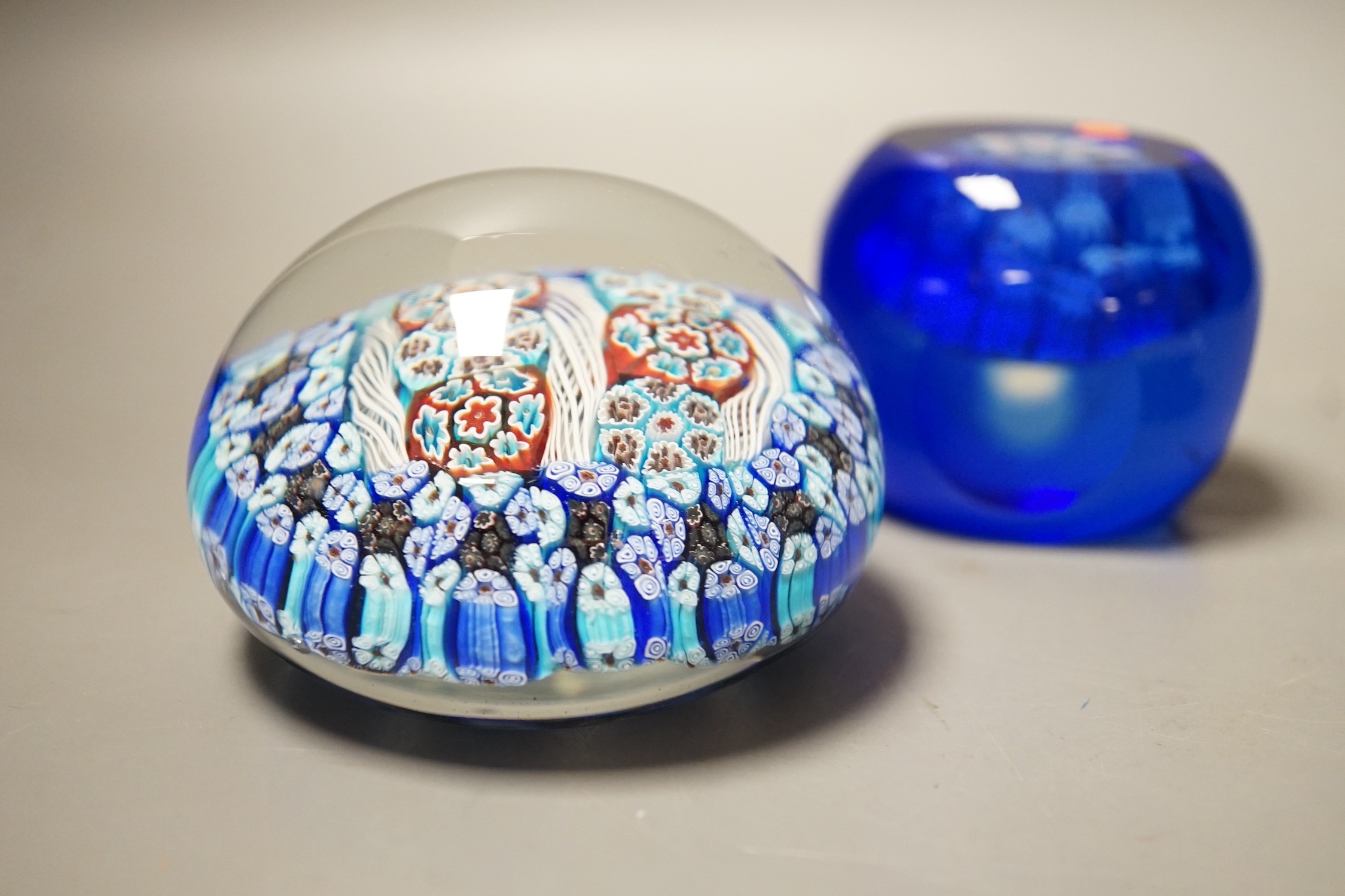 Three millefiori glass paperweights, largest 8cm diameter